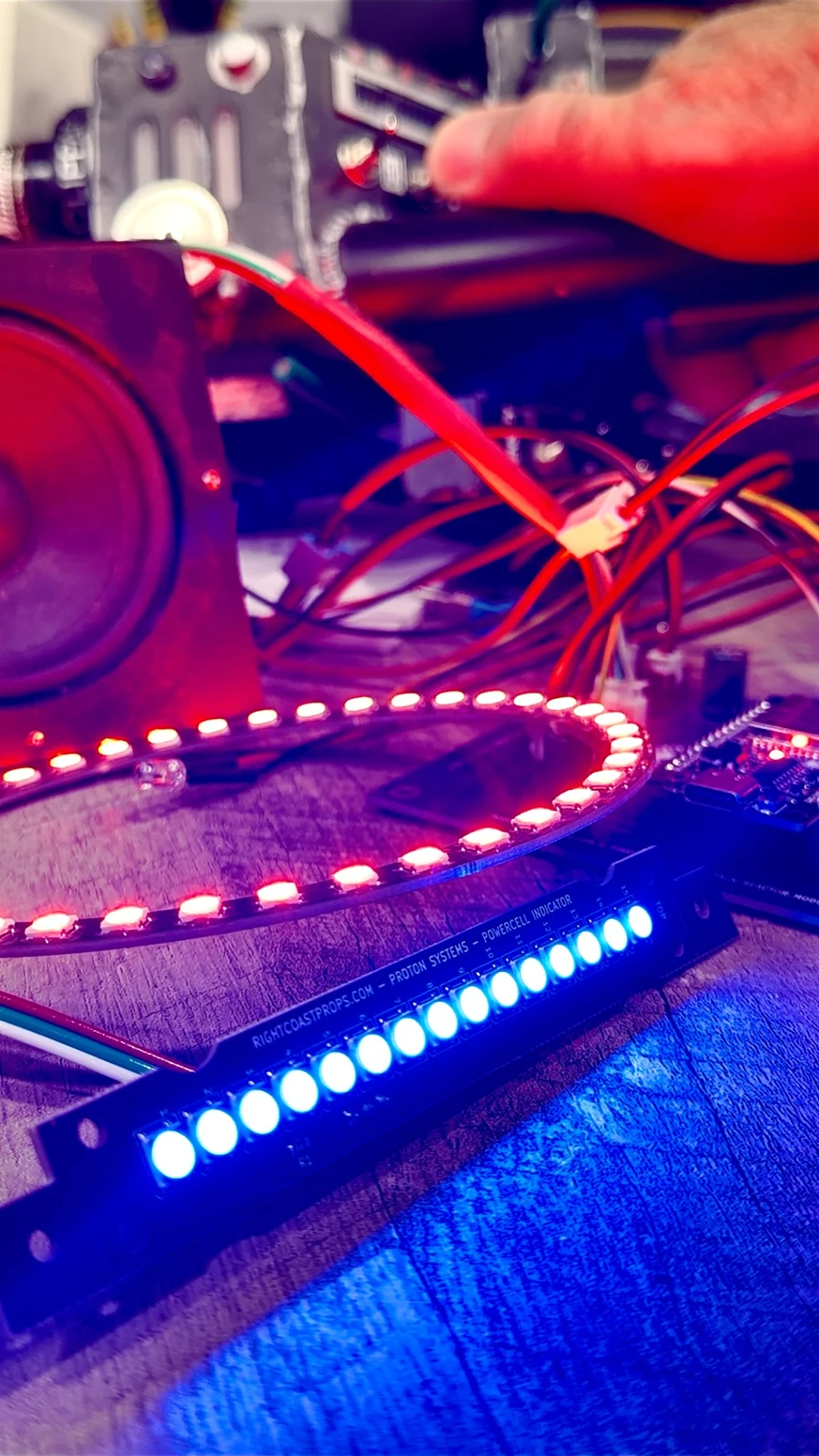 RIFT lighting system glowing red and blue during a workbench test