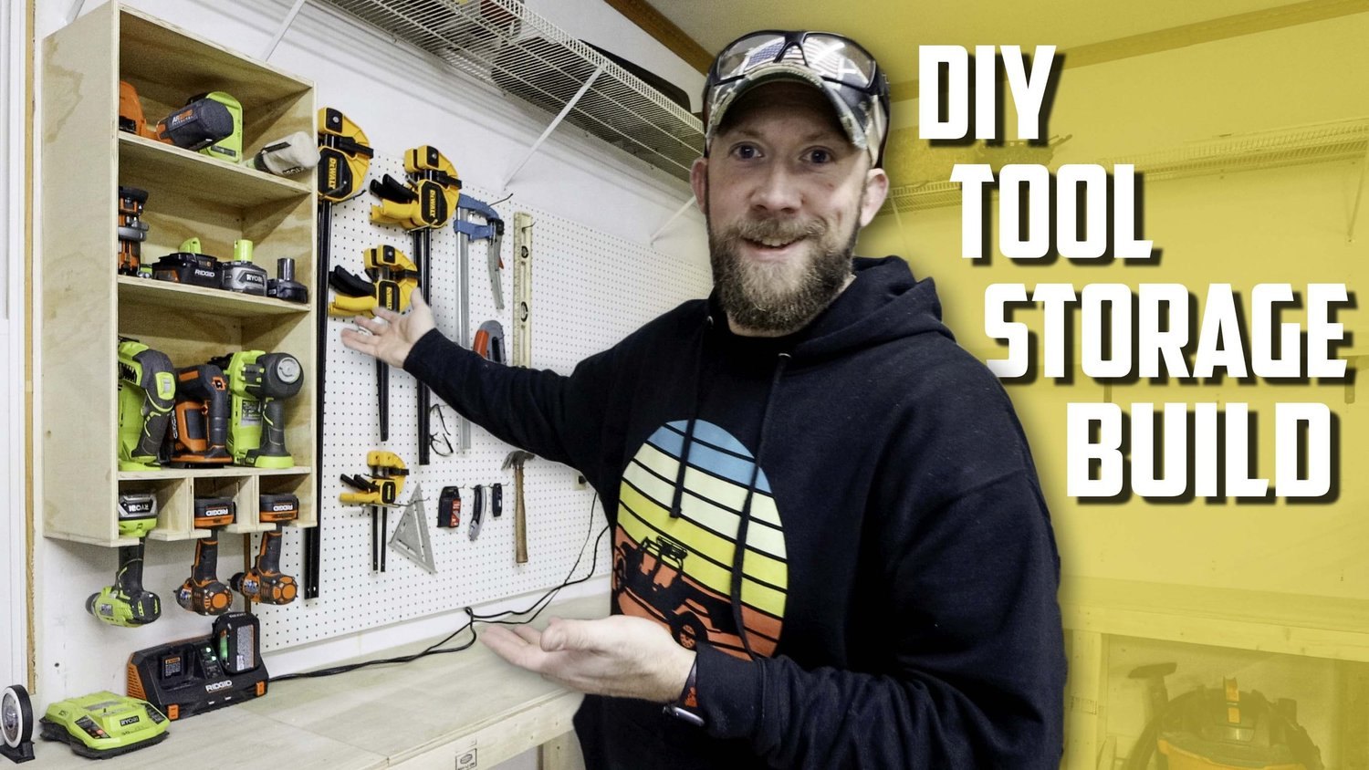 Craig with a handmade cordless power tool storage cabinet